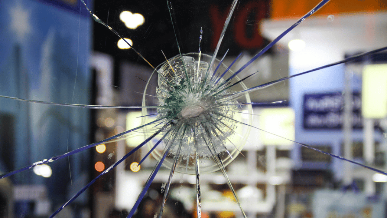 bulletproof glass after impact shown at display