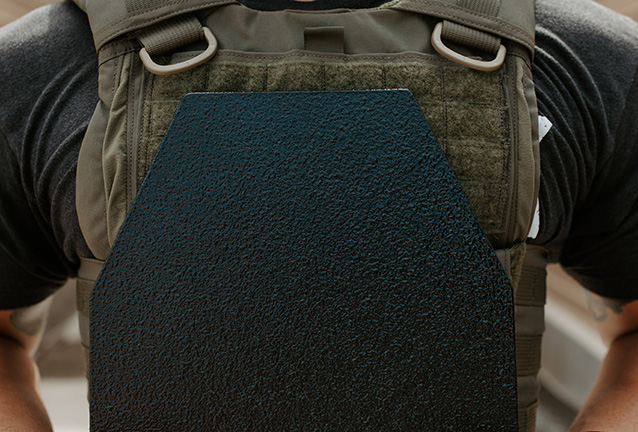 Close-up of Kontek Raider NIJ III certified armor plate fitted into a tactical plate carrier.